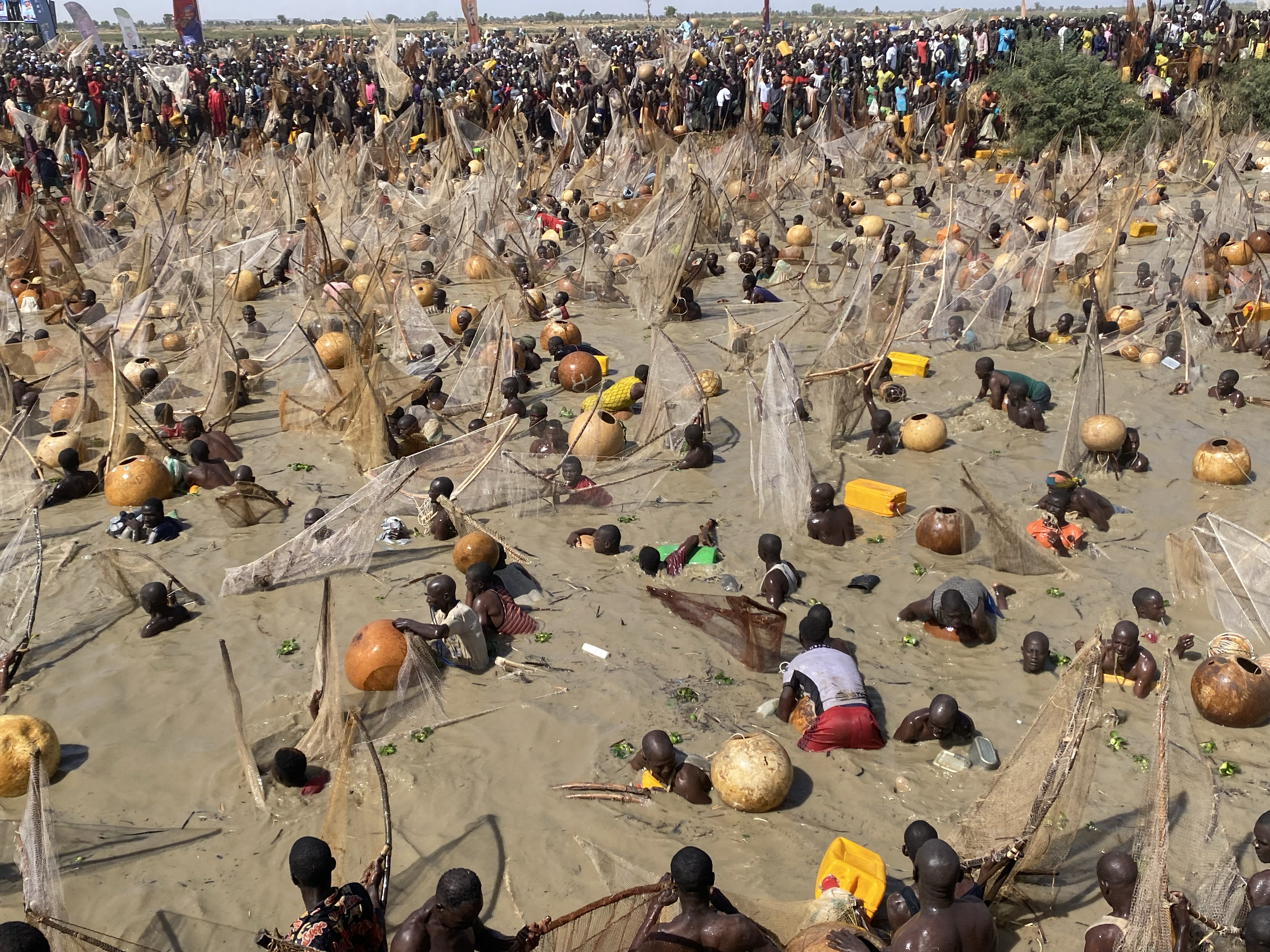 Fishermen Fishing In The River