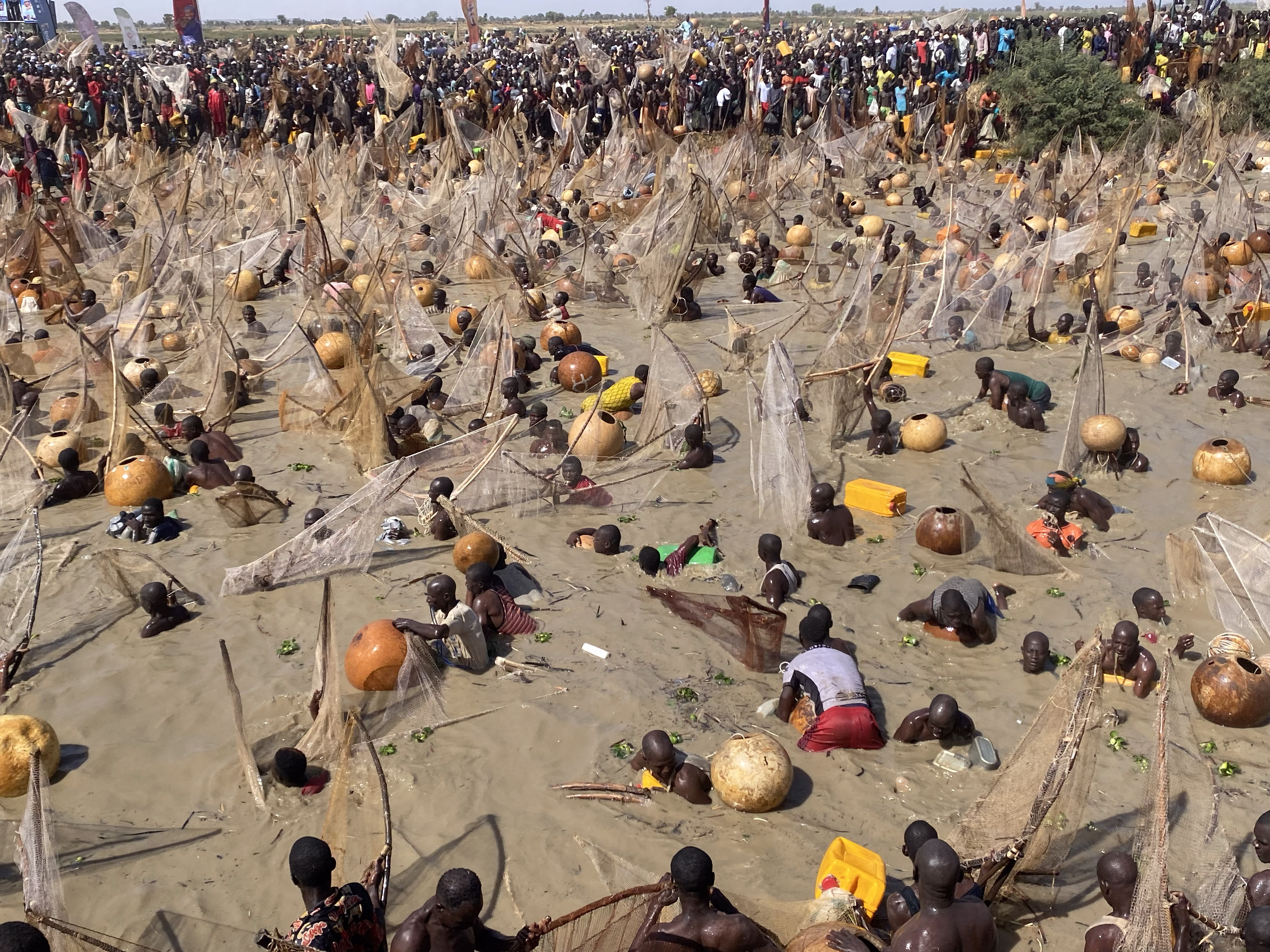 Fishermen Fishing In The River