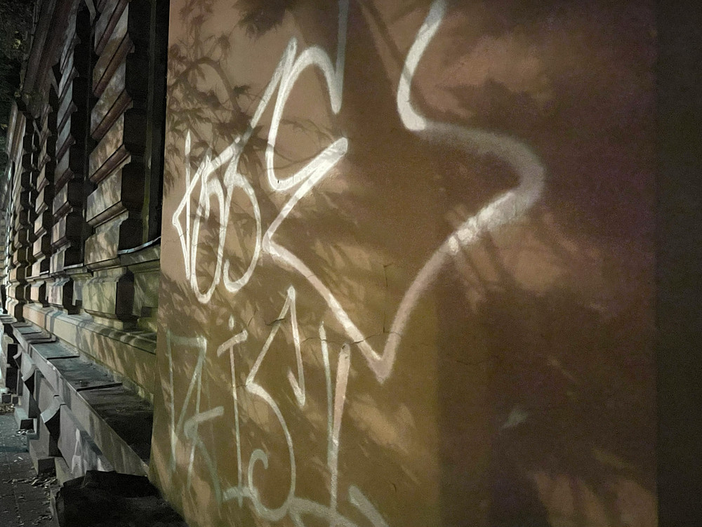 along the wall 